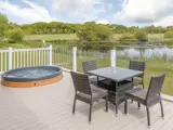 Beautiful lake views and sunken hot tubs at Florence Springs Luxury Lakeside Lodges - Tenby, Pembrokeshire, South Wales