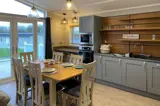 Snowdrop Lodge dining area - Florence Springs Luxury Lodges with hot tubs, Tenby, Pembrokeshire, South West Wales